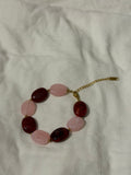 Rood/Roze kralen armband