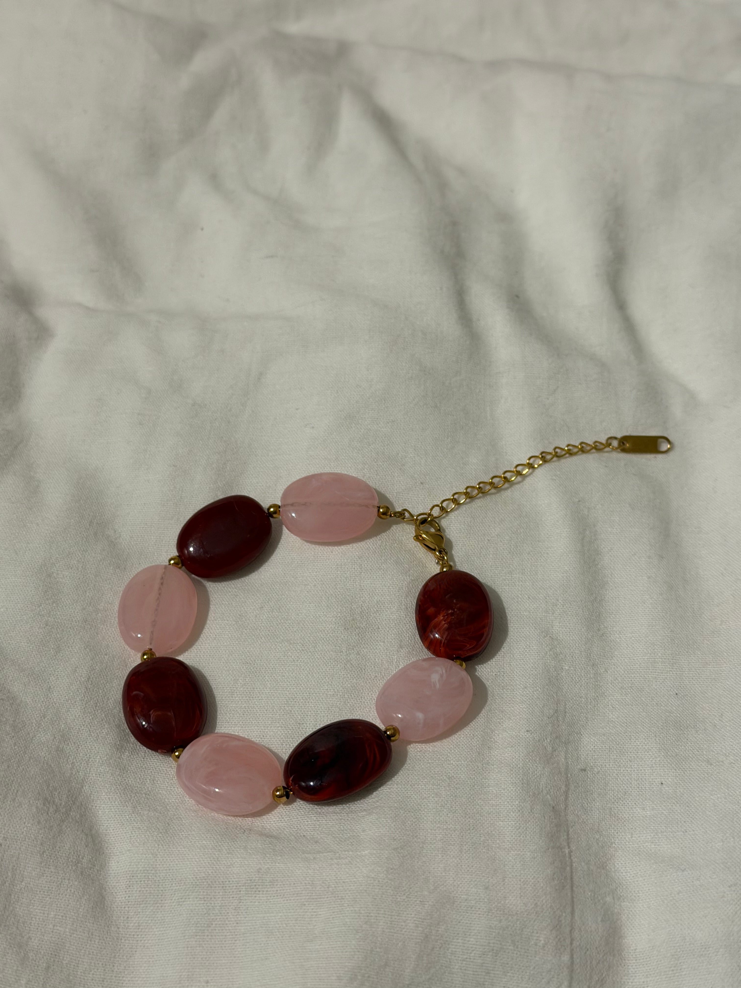 Rood/Roze kralen armband