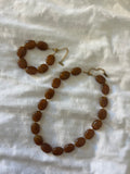 Bruine kralen set (ketting en armband)