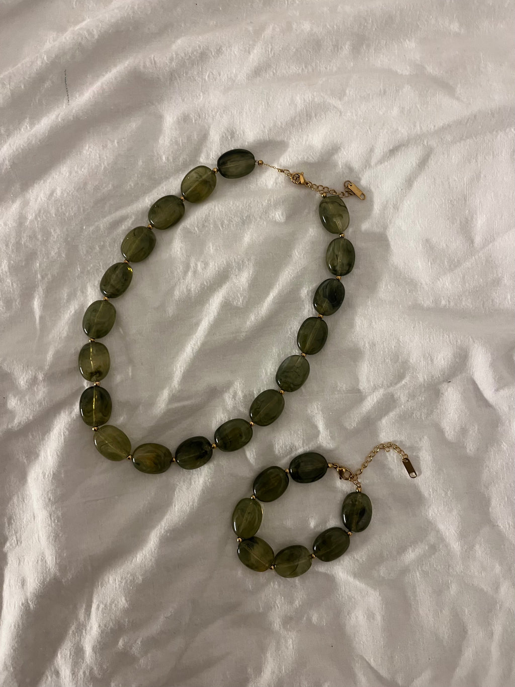 Groene kralen set (ketting en armband)