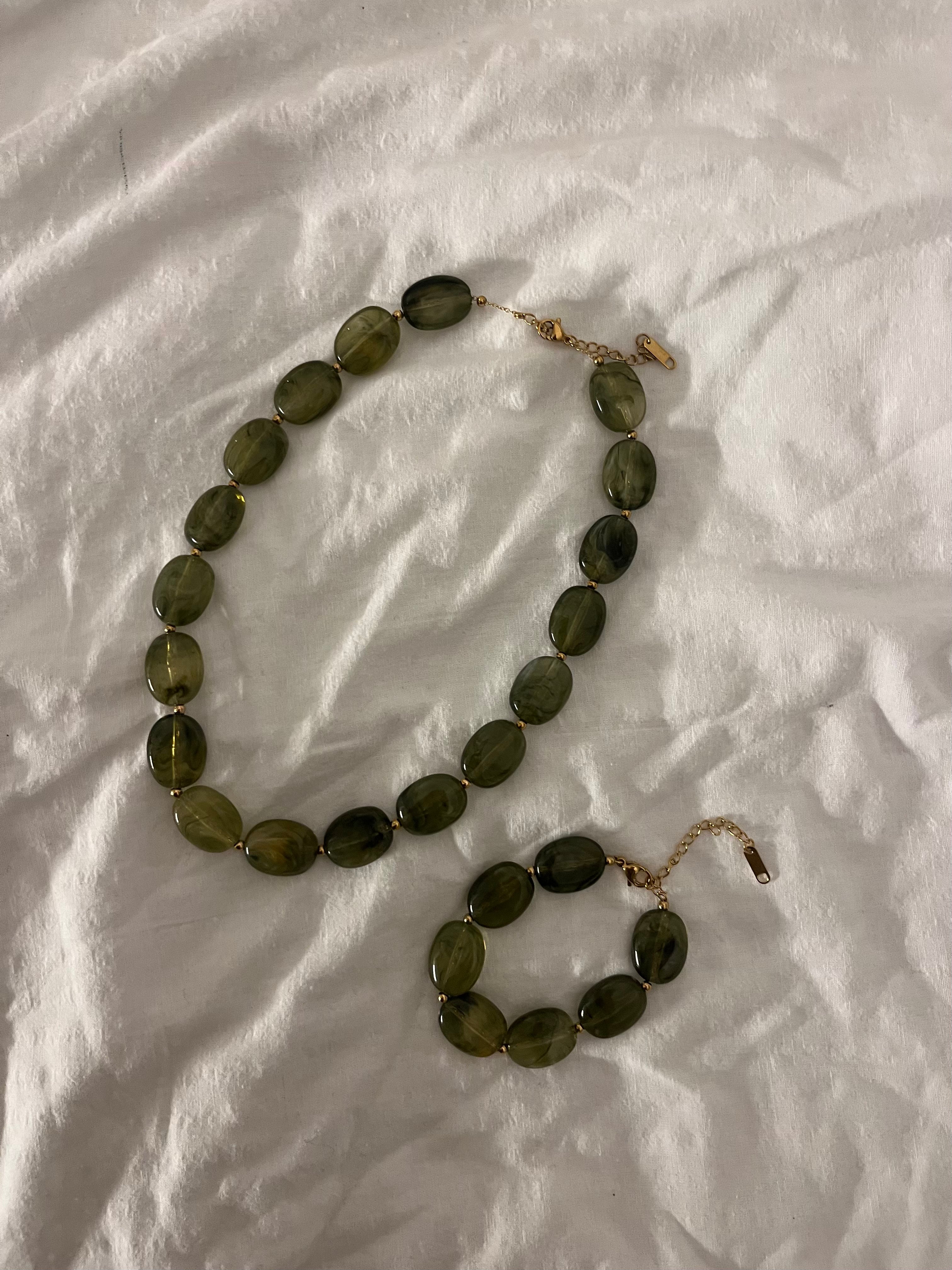 Groene kralen set (ketting en armband)