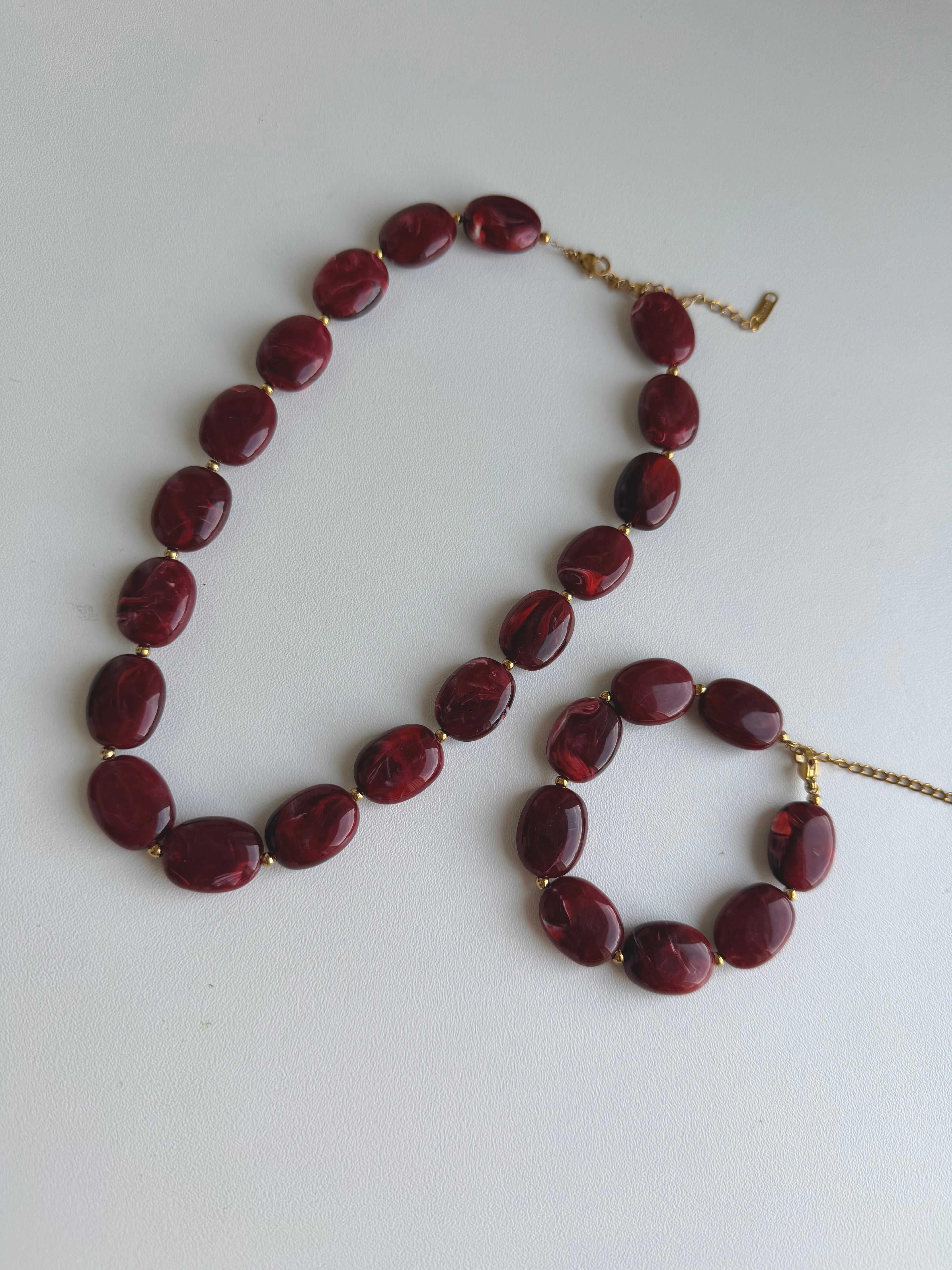 Rode kralen set (ketting en armband)
