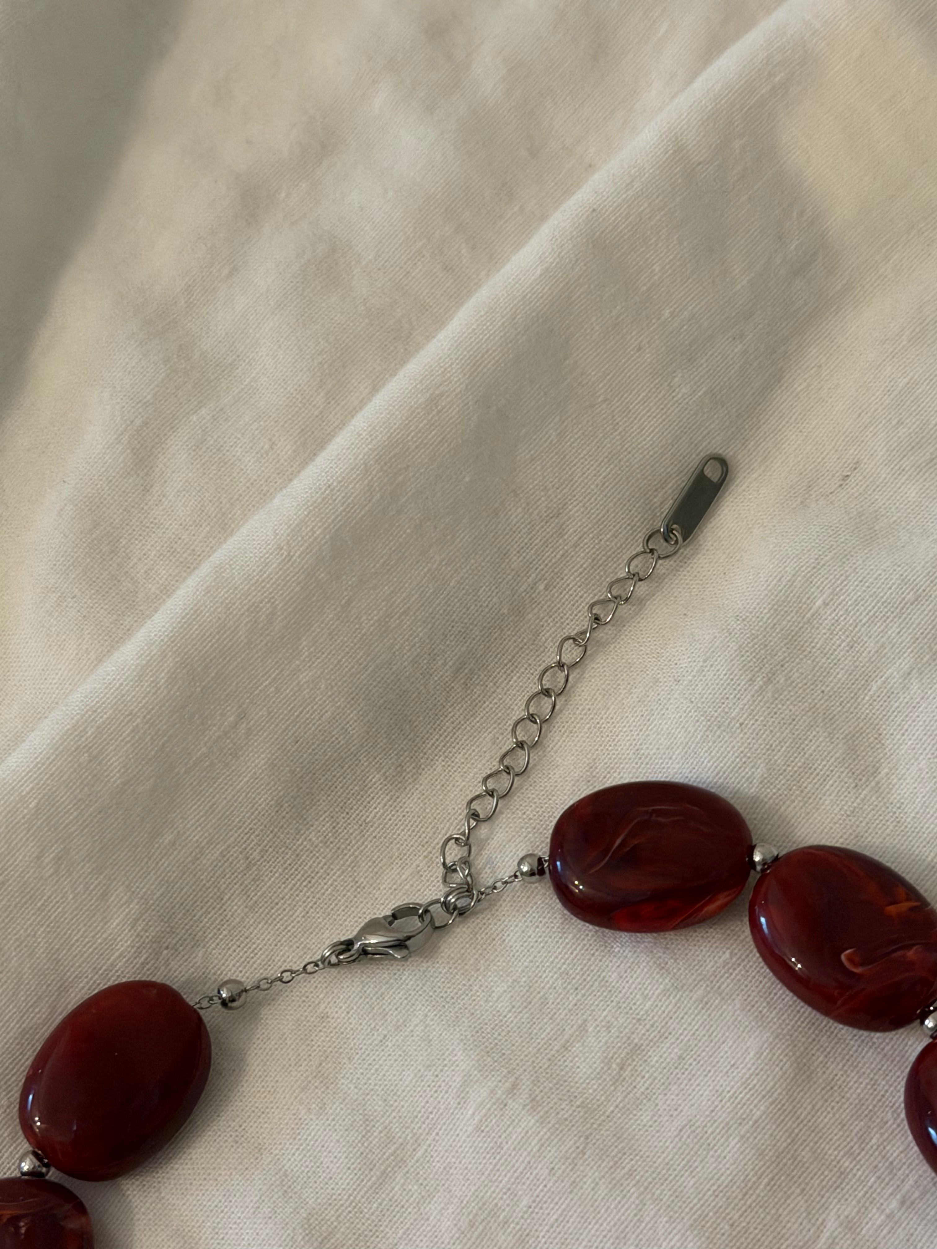 Rode kralen ketting